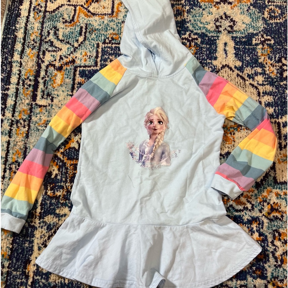 Elsa hooded long sleeve shirt. Never worn. Pen mark as shown